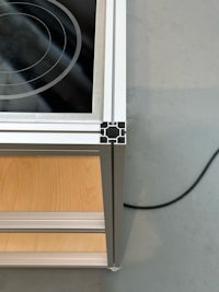 an electric stove is sitting on top of a table